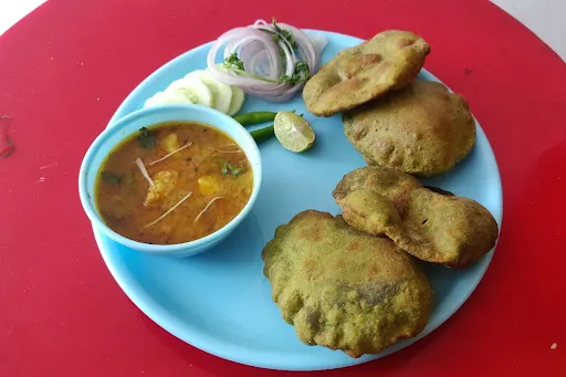 Palak Poori And Aloo Tamatar