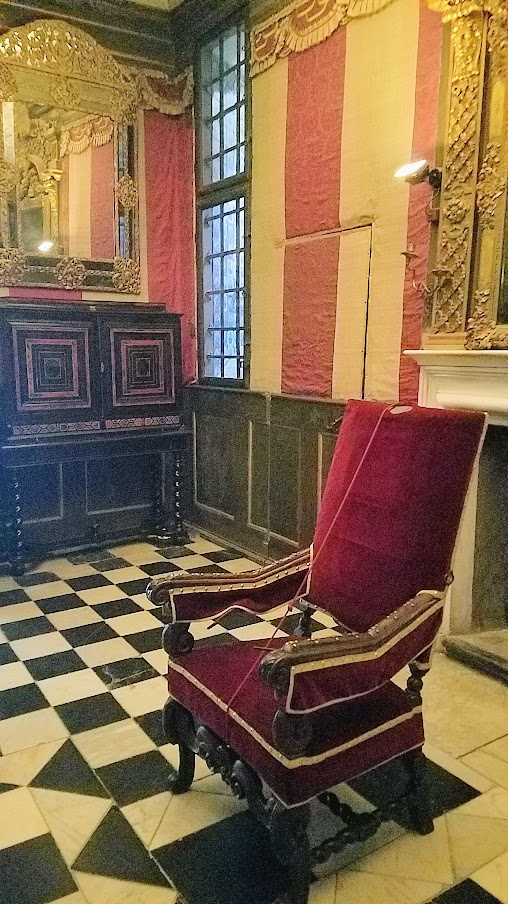 Visiting Rosenborg Castle in Copenhagen, offering 400 years of history particularly artifacts and stories from one of Denmark's most colorful kings, Christian IV. In the next room, known as the Dark Room because it very little light after a tower was built. Also weird, this Trouser Watering chair which apparently is the forerunner of the whoopee cushion - it has securing devices to hold down the person sitting concealed in the armrests, and per the museum notes, The strapped person could then be soaked by water running from vessels in the back of the chair through pipes in the seat. When the victim was released and stood up from the chair, a trumpet hidden in the seat would toot.