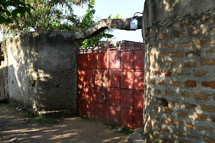 The main gate to the house where a Ugandan househelp was killed.