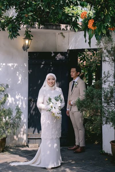 結婚式の写真家Muhazim Mahdzar (hellojim)。2022 2月21日の写真