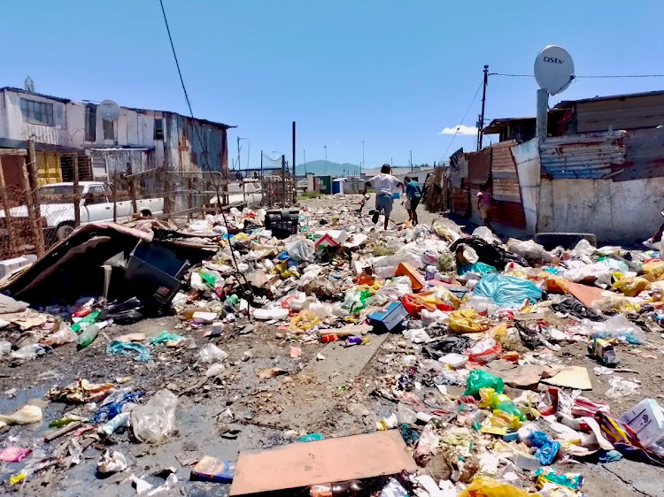 This is one of many areas in Kosovo informal settlement in Samora Machel that has not been cleaned for months, because it is too dangerous for workers of the company contracted by the City of Cape Town to clean the area. Picture: GROUNDUP