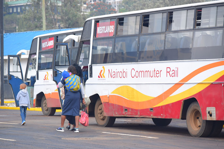 Commuters transfer on the first test run at the Green Park Terminus.