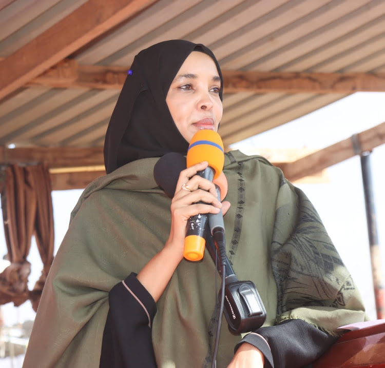 Wajir Woman Representative Fatuma Jehow speaking in Wajir town on Monday. She urged the government to use the ongoing rains to mitigate effects of future droughts.