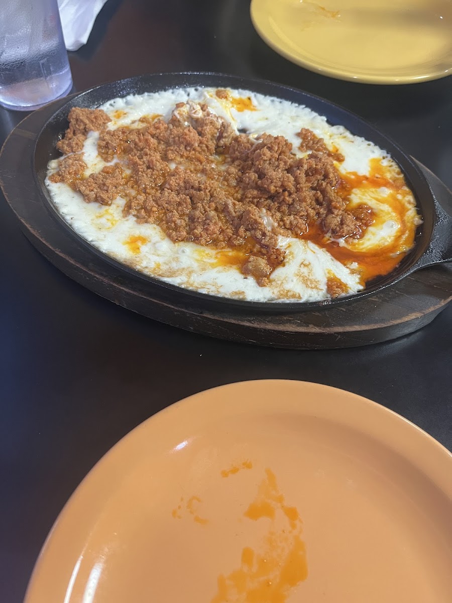 I queso fundido con chorizo be sure to ask for corn tortillas in the side.