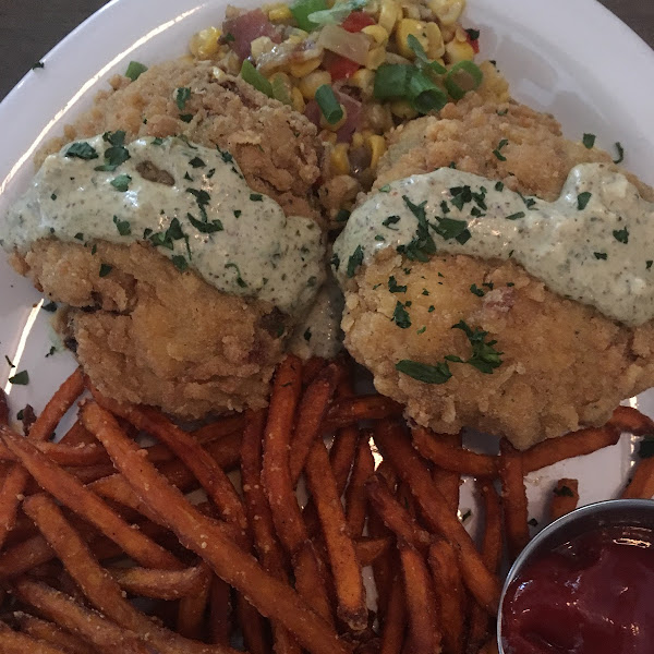 GF crab cakes with sweet potato fries! So good! The crab cakes were lightly battered and flakes easily with a fork!