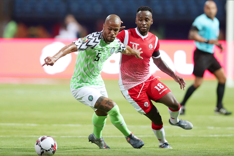 Saido Berahino of Burundi challenges William Paul Ekong of Nigeria during their 2019 Africa Cup of Nations at the Alexandria Stadium, Alexandria