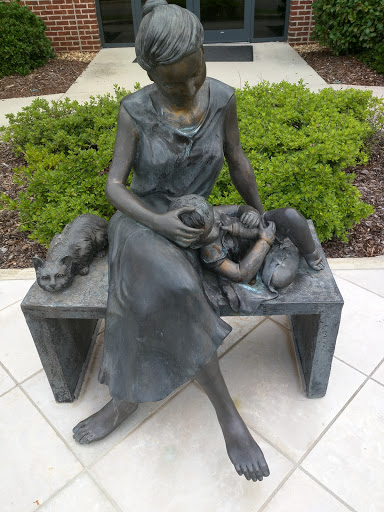 Woman and Child Statue