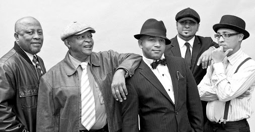 Hugh Masekela and his band. He played with his band at gigs around the world until shortly before his death in 2018.