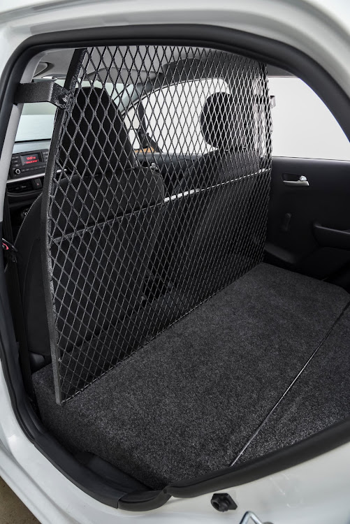 A steel grid protects the driver and passenger from loose cargo.