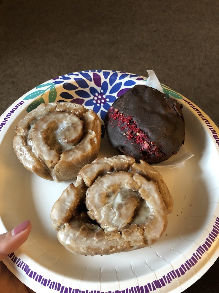 Cinnamon rolls and chocolate dipped raspberry brownie