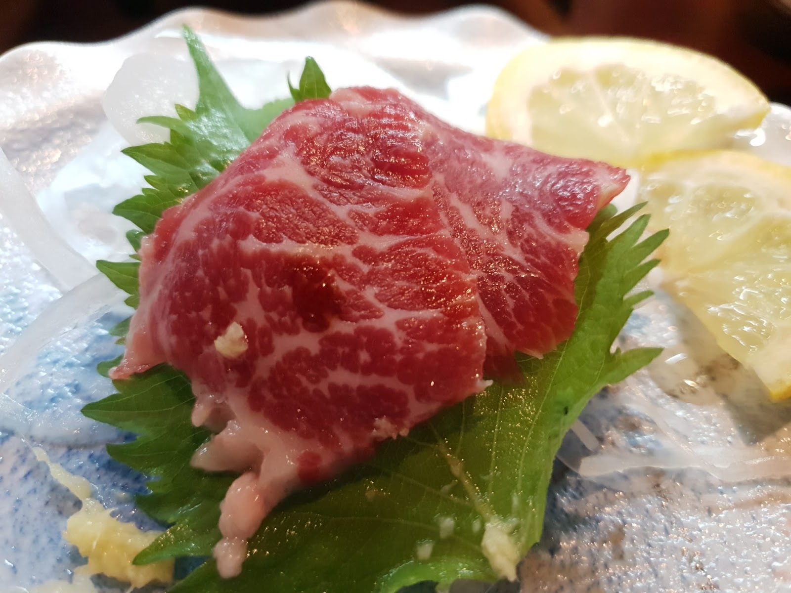 marbled piece of horse sashimi