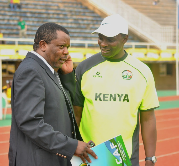 Former Cecafa secretary general Nicholas Musonye talks to former Harambee Stars coach James Nandwa