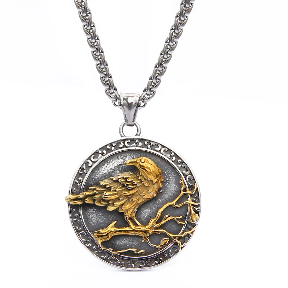 Collier pendentif en acier inoxydable Viking Corbeau Oiseau. Un bijou homme pour un look nordique unique. Porte-bonheur et symbole de sagesse.
