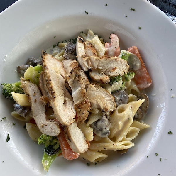 Housemade Fettuccine Primavera with gluten-free penne noodles