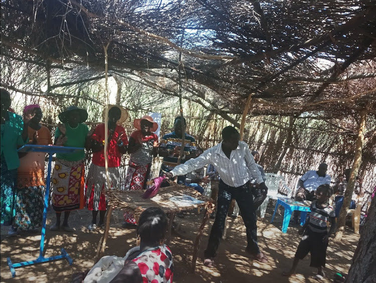 Locals and missionaries hold church service in a shrub-thatched structure at remotest Kong’or village in Tiaty, Baringo County on Tuesday, November 3.