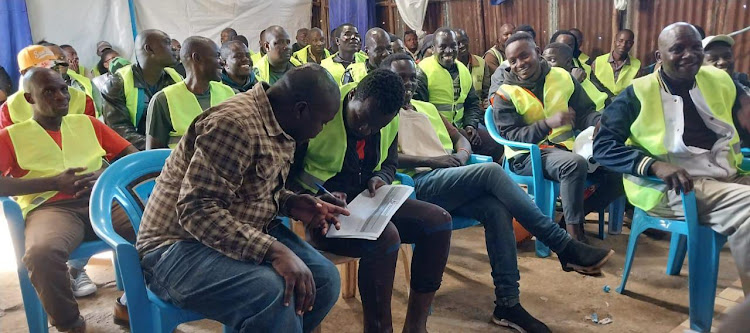 Men from Kibra and Lang'ata constituencies attend the Men's Forum on Teenage Pregnancy Prevention in Kibera on Thursday