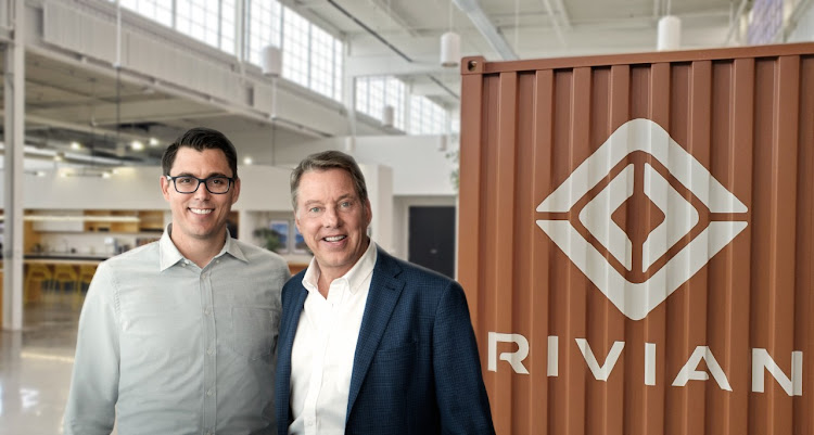 Rivian CEO and founder RJ Scaringe with Bill Ford, executive chairman of Ford.