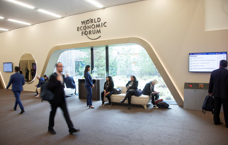 Participants are seen at the congress hall, the venue of the World Economic Forum 2022 (WEF) in the Alpine resort of Davos, Switzerland May 23, 2022.