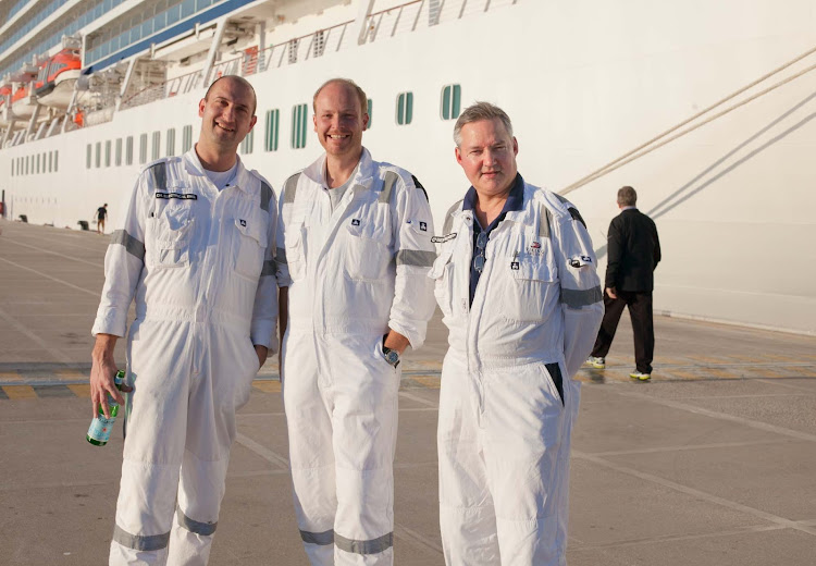 Chief engineer Peter Nilsson, right, with two other ship engineers standing aside the Viking Star.