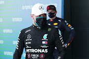 Valtteri Bottas is not a fan of Mercedes' new black overalls. The Finnish driver says they are driving up cockpit temperatures. 