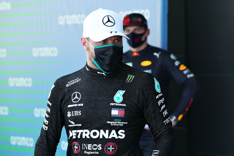 Valtteri Bottas is not a fan of Mercedes' new black overalls. The Finnish driver says they are driving up cockpit temperatures.