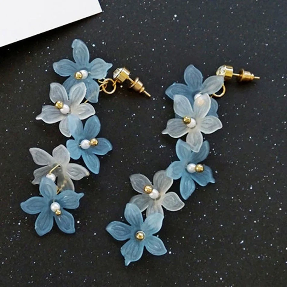 Brincos longos e largos de pétalas de flor de cerejeira com borlas, super fada, para um visual delicado e feminino com personalidade.