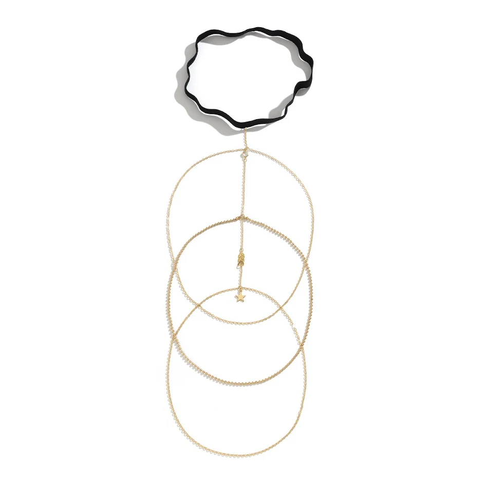 Chaîne de jambe décontractée, motifs étoiles et franges, ornée d'épis de blé, accessoire polyvalent et tendance pour toutes les tenues.