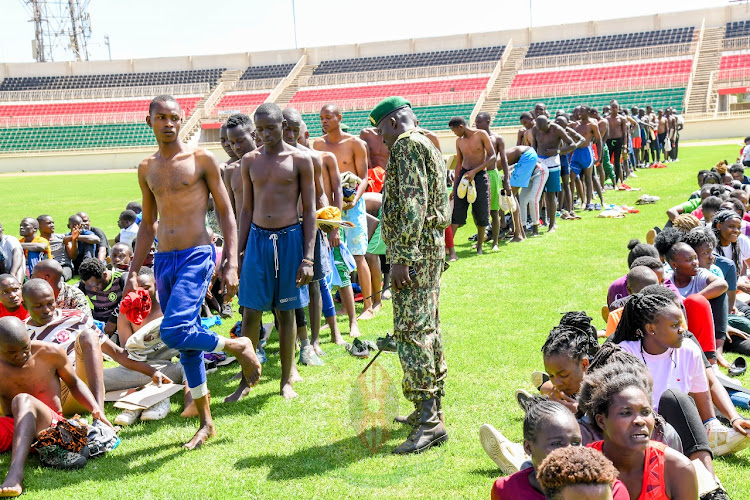 A section of youth who turned out for the NYS recruitment undergo physical tests at the Nyayo stadium in Nairobi on February 9, 2024.