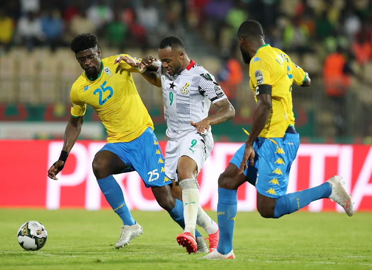 Jordan Ayew of Ghana is challenged by Junior Akue Assoumou Ecuele Manga of Gabon in the 2021 Africa Cup of Nations match at Ahmadou Ahidjo Stadium in Yaounde, Cameroon on January 14 2022.