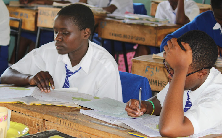 Students at Emmanuel Namunyu Memorial High school during an English lesson on Tuesday, October 4.