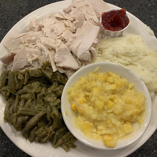 Turkey, cranberry sauce, mashed potatoes, creamed corn, green beans