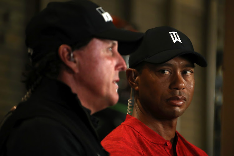 Tiger Woods, right, and Phil Mickelson have entered the PGA Championship. Picture: CHRISTIAN PETERSEN/GETTY IMAGES