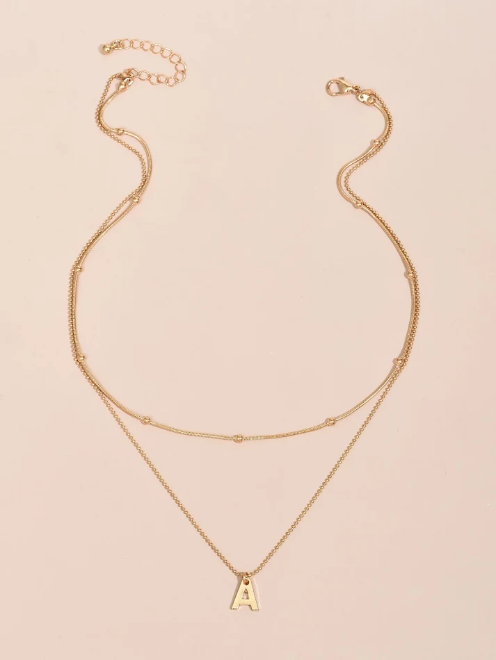 Collana da donna multistrato con lettere, moda europea e americana, nuova personalità, per un look unico e alla moda, da non perdere.