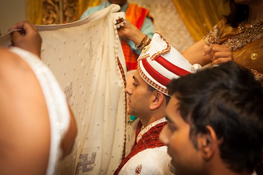 結婚式の写真家Kishen Borkhatria (indianweddingph)。2014 1月24日の写真