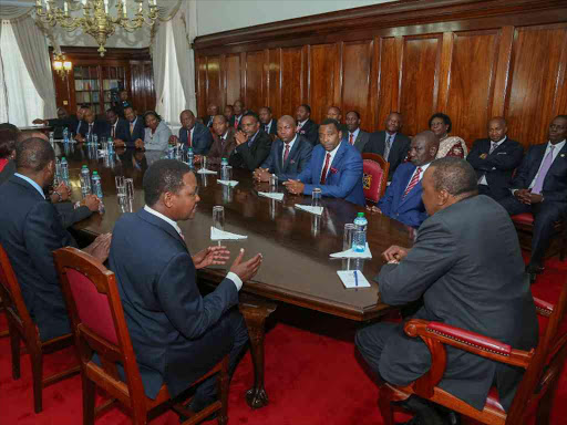 President Uhuru Kenyatta meets with leaders from the Lower Eastern region at State House, Nairobi. Also present are Deputy President William Ruto and Machakos Governor Alfred Mutua. /FILE