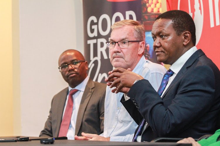 Intrepid general manager East Africa Samuel Karani, Co-Founder and Chairman Darell Wade and Tourism and Wildlife CS Alfred Mutua during the company's Nairobi forum where it announced plans to expand investments in East Africa/ ENOS TECHE