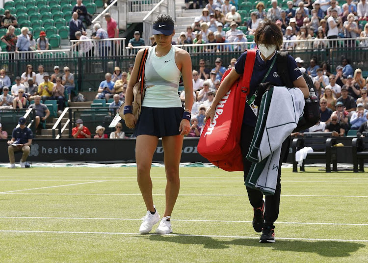 Britain's Emma Raducanu retires from her first round match against Switzerland's Viktorija Golubic due to injury at the Nottingham Open on June 7, 2022