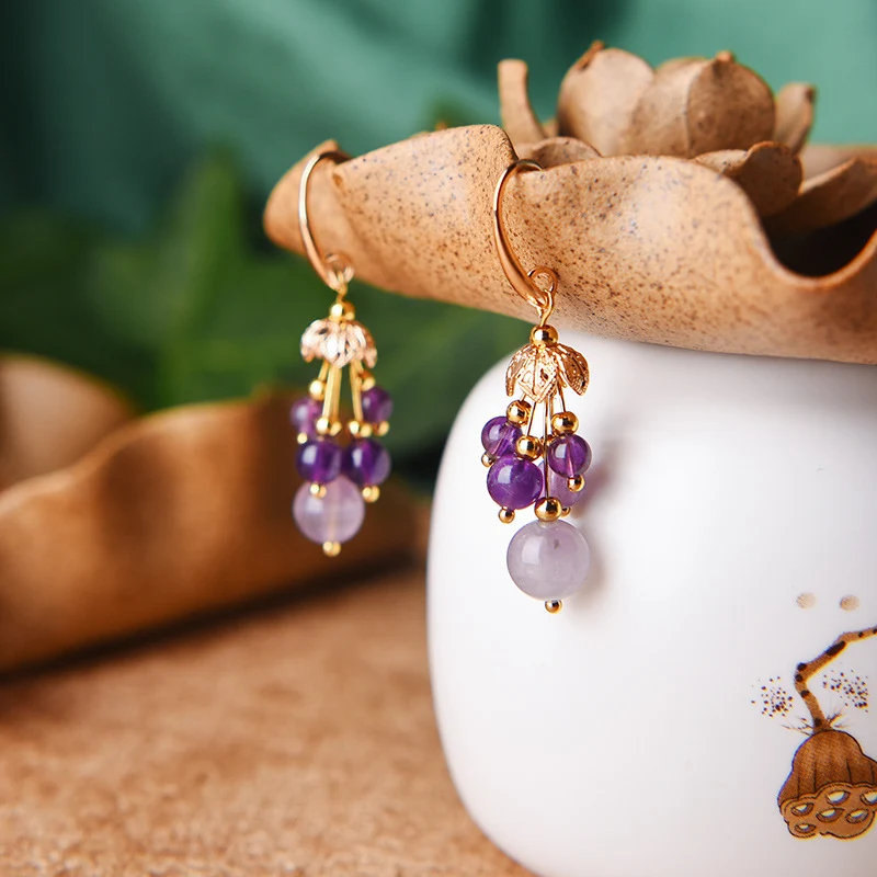 Boucles d'oreilles Super Fairy Girl style ethnique tempérament. Rehaussez votre style avec ces boucles d'oreilles uniques et élégantes pour une touche de charme.
