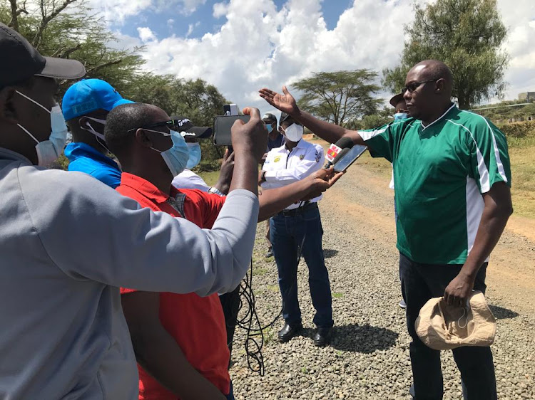 WRC Safari Service Park Manager Anthony Gatei (in green shirt) during a recent visit to the Safari Rally route.