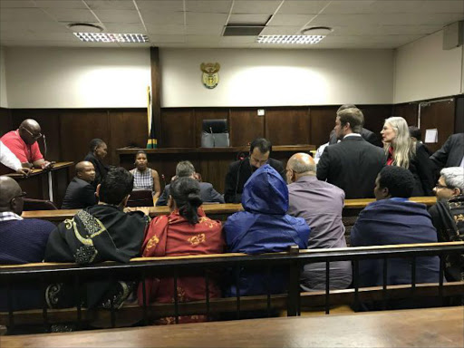 The people arrested following raids on Gupta properties are appearing in the Bloemfontein Magistrate’s Court Picture: Graeme Hosken