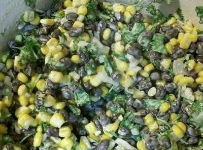 SOUTHWESTERN CORNY BLACK BEAN SALAD is a tasty combination of fresh grilled corn, black beans and chopped cilantro in a creamy spicy dressing. Double the recipe and serve with tortilla chips for a refreshing change from the usual dips.