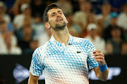 Novak Djokovic of Serbia reacts in his quarterfinal against Andrey Rublev on day 10 of the 2023 Australian Open at Melbourne Park on January 25 2023. 