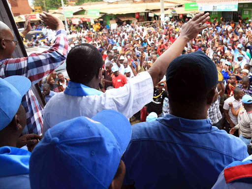 Wiper Democratic Movement Leader Kalonzo Musyoka at Voi Bus park where he acknowledged greetings from the residents. COURTESY