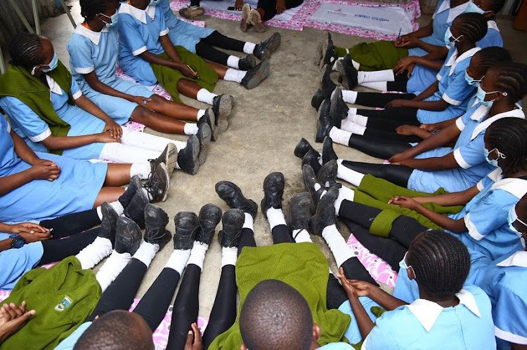 School Girls during a mentorship and counselling exercise at Inua Dada Foundation Center in Korogocho, Nairobi.