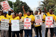 Abahlali baseMjondolo (AbM) members stage a protest. Amnesty International's Human Rights Day message highlighted the harassment and alleged killings of AbM activists.

Images: Nqubeko Mbhele