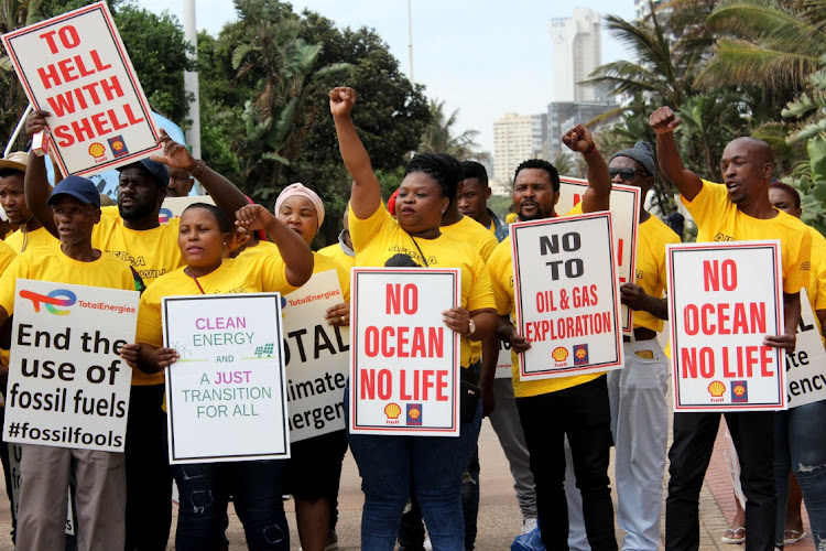 Abahlali baseMjondolo (AbM) members stage a protest. Amnesty International's Human Rights Day message highlighted the harassment and alleged killings of AbM activists. Images: Nqubeko Mbhele