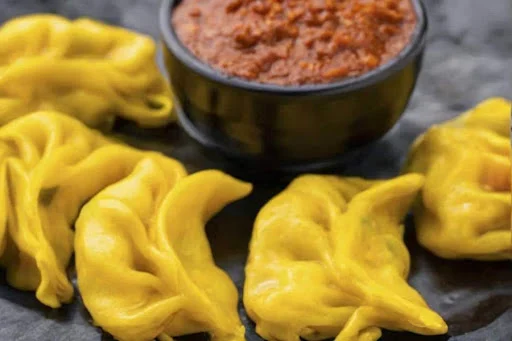 Butter Chicken Pan Tossed Momo [7 Pcs