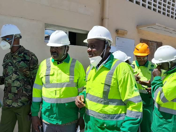 From Left: Kakamega County department of education CEC Godfrey Owuor and the Kakamega National Environment Management Authority (NEMA) county director for environment John Maniafu during their visit to Mombasa to witness the distruction f the contaminated cereals