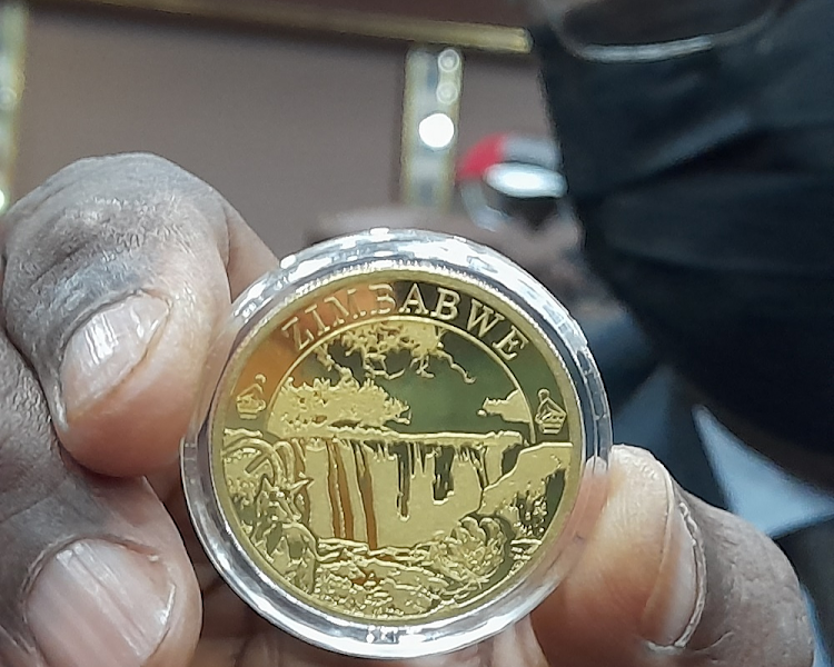 The gold coin unveiled by the Zimbabwe central bank.