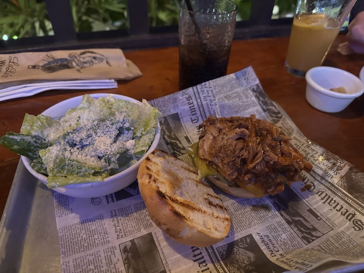 GF bun, with burger & pulled pork + ceasar salad